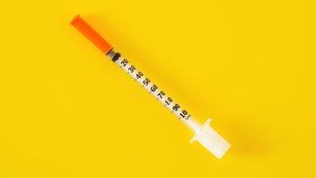 Lupron: injection medication on yellow background-1307778245