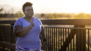 Health: Movement and exercise: woman power walking outside 1388067016
