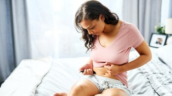 Diabetes: woman injection in side 1156718067