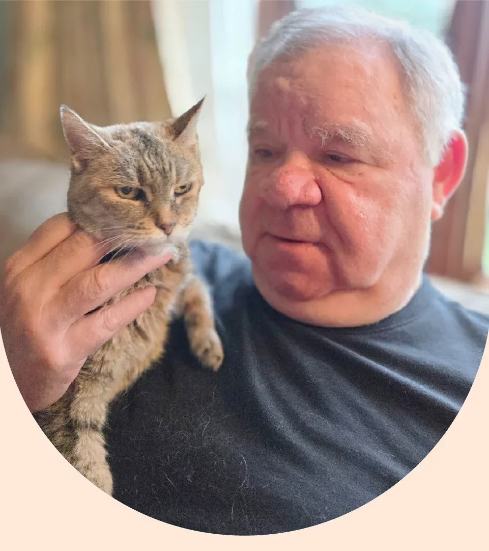 Morris Armstrong is pictured with his cat, Autumn.