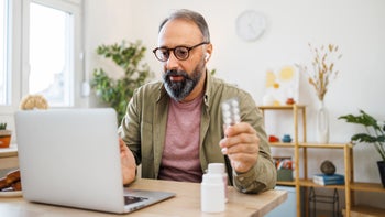 Health: Nifedipine: man tele health appointment 1456010371