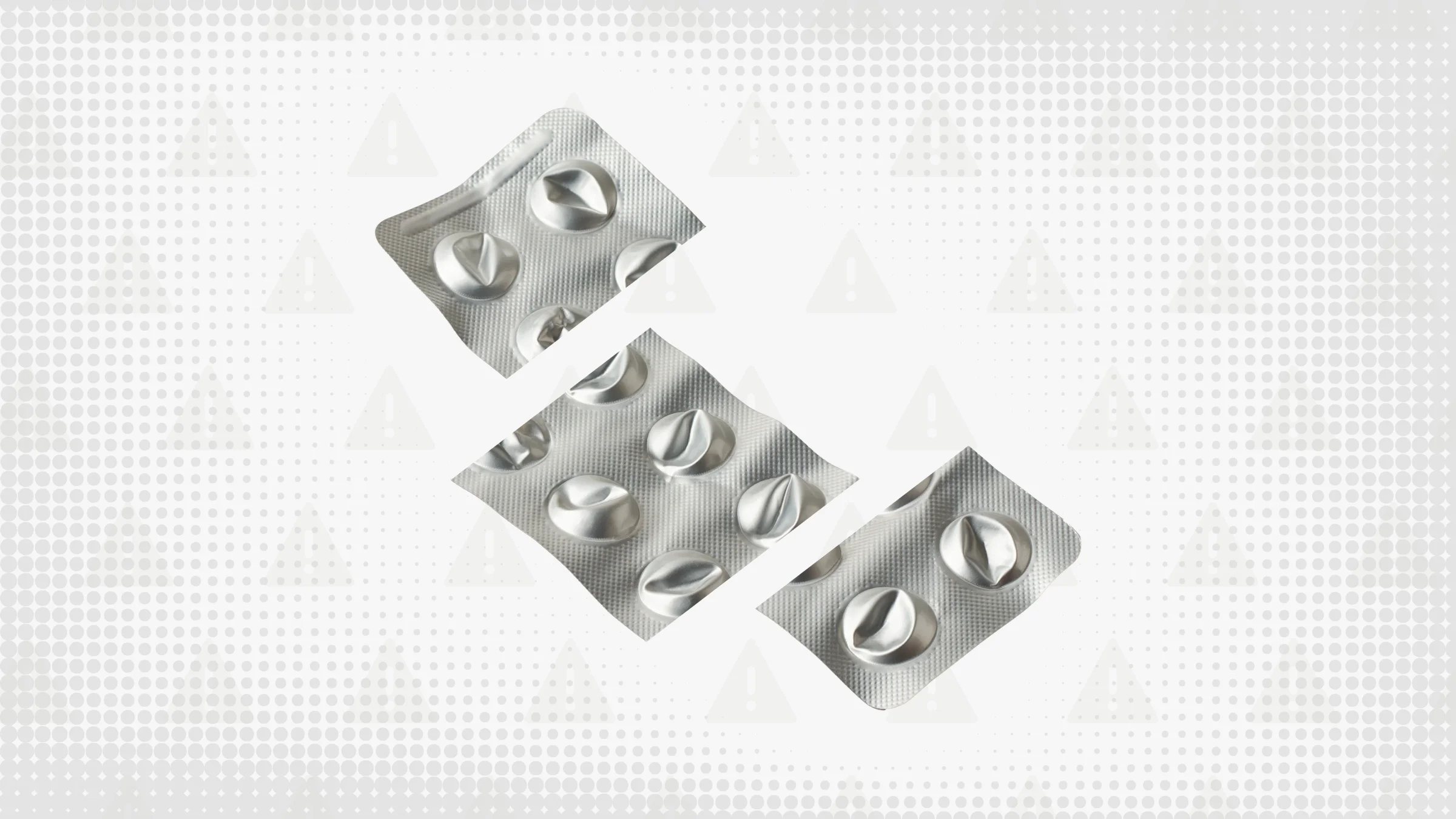 Gray background with texture and warning sign pattern. In the center is an empty, punched-out blister pack for round pills, cut into thirds.  