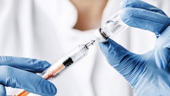 Health: Heparin-sodium: closeup syringe and vial 665515600