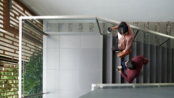 Health: Movement and exercise: overview shot of people walking in stairwell 1382459793