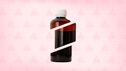 A graphic includes a reddish background with a warning-sign patter and an amber liquid medication bottle cut into thirds.
GoodRx Health