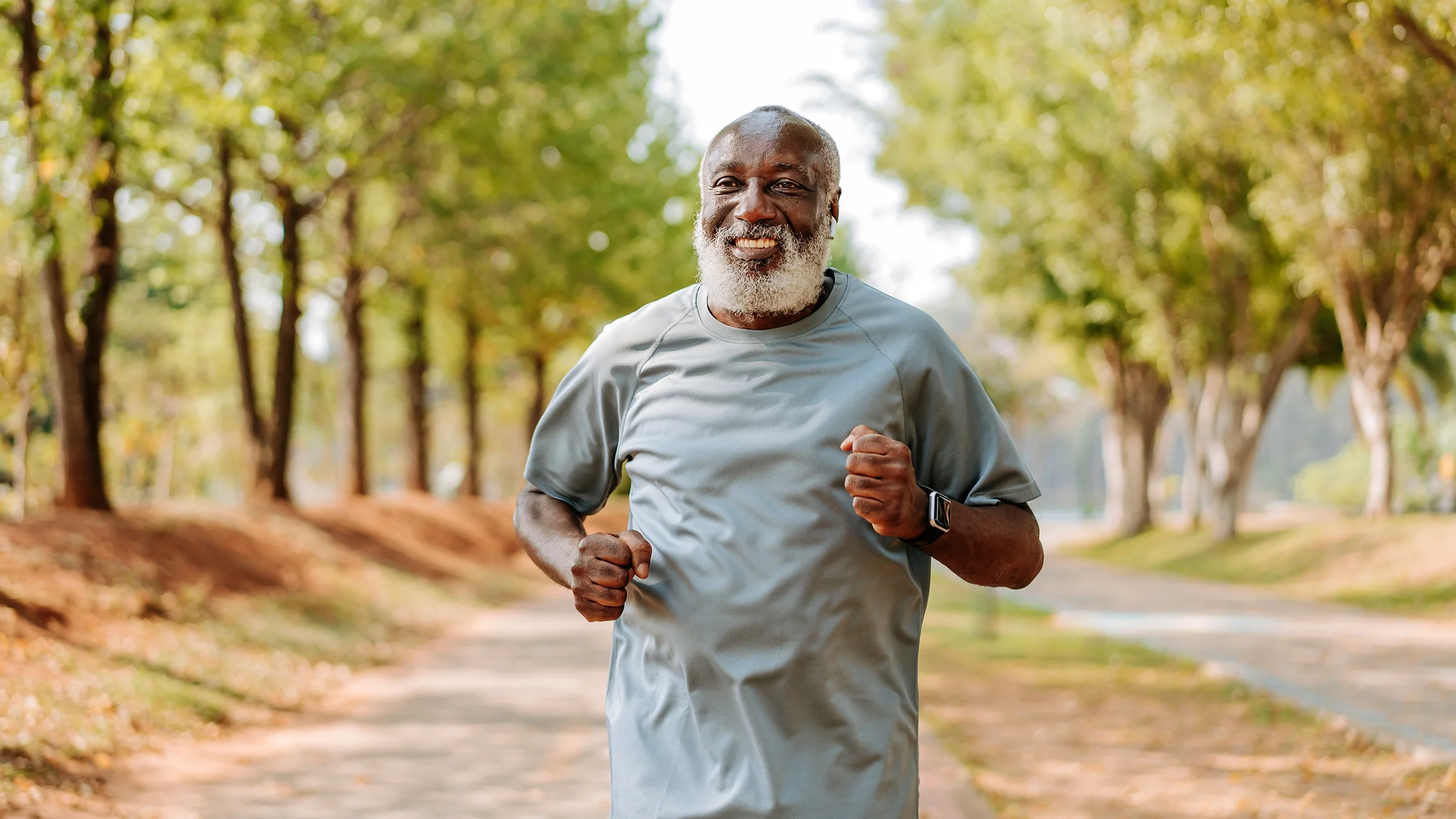 A man runs to maintain good health.