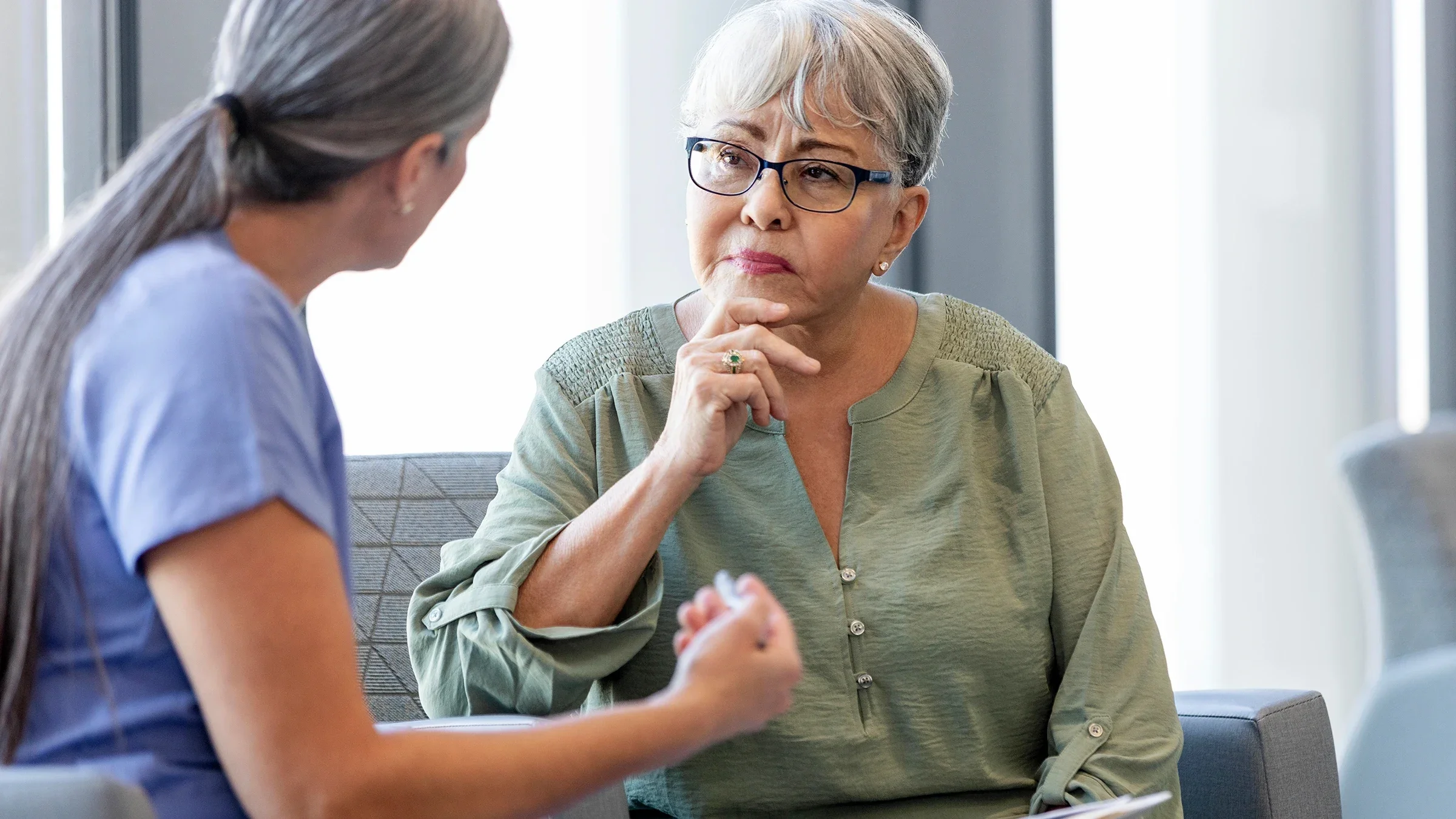 A healthcare professional is speaking to a woman during a consultation.
SDI Productions/E+ ia Getty Images