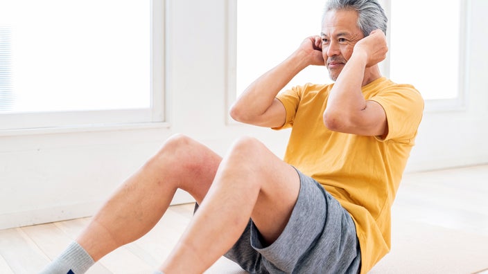 Man doing sit-up exercise.