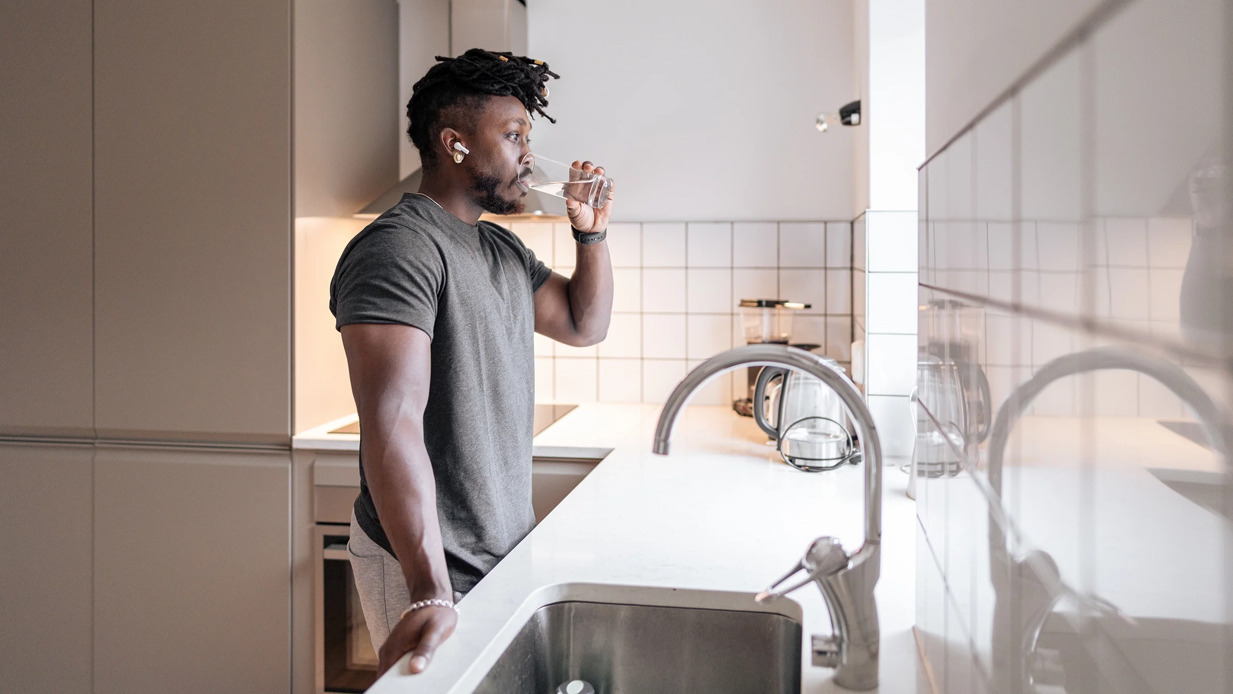 Man drinking a glass of water