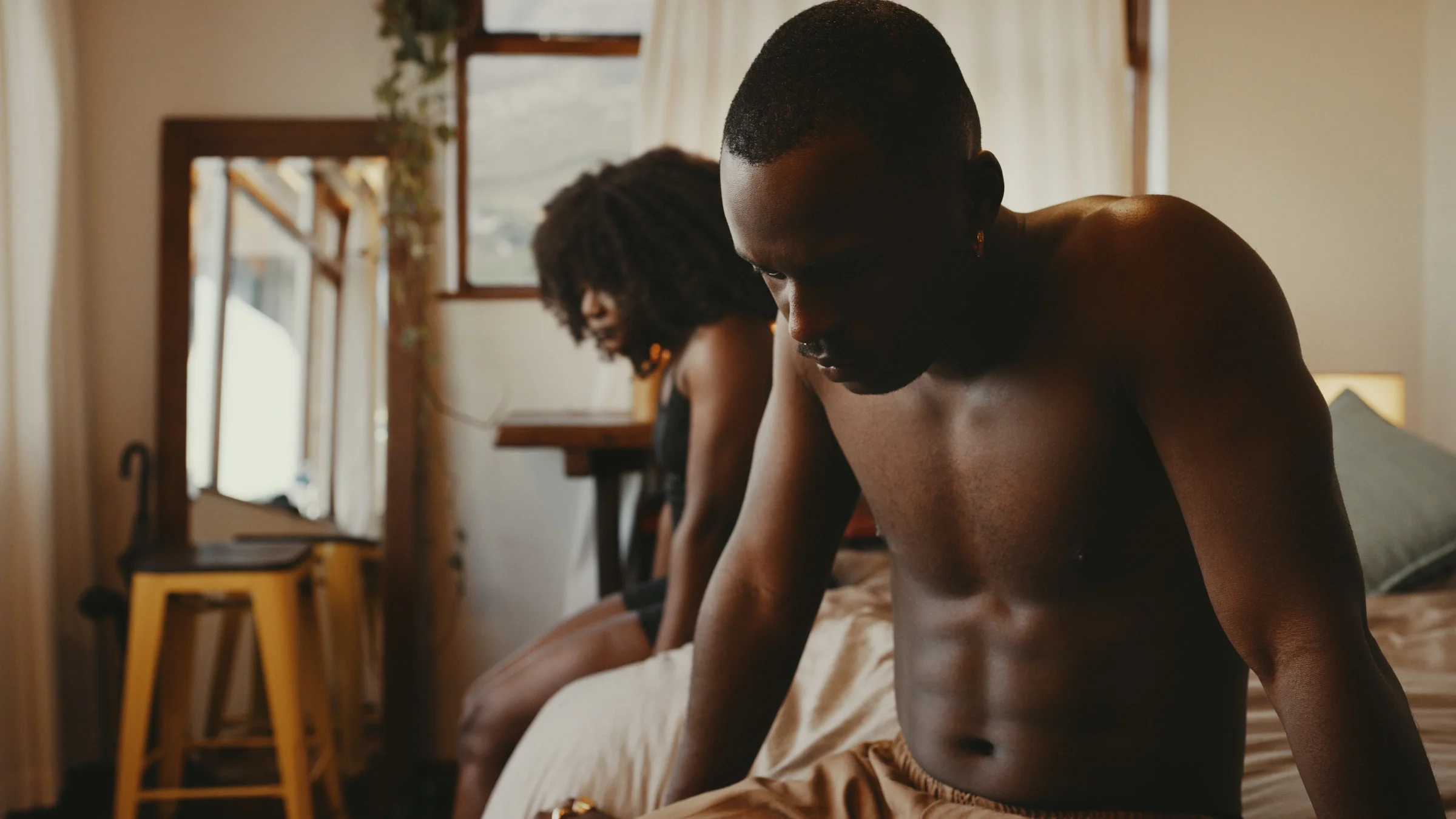Young couple having an argument in the bedroom