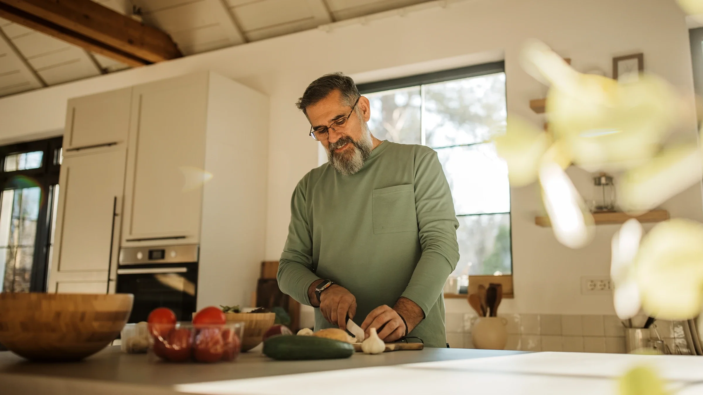 A man preps a meal at home.