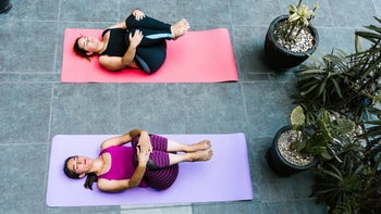 Movement-exercise: women knee to chest yoga stretch 1323965328