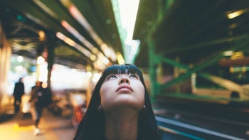 Health: Sleep: close up woman looking up cityscape GettyImages-932096974