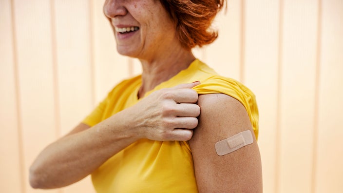 Woman after receiving a vaccine shot