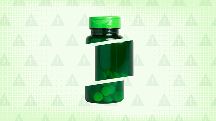 A custom graphic features a green background with a warning sign pattern and a green vitamin bottle cut into thirds. 