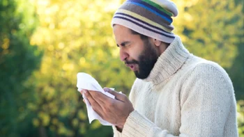Allergies: man sneezing 507774005