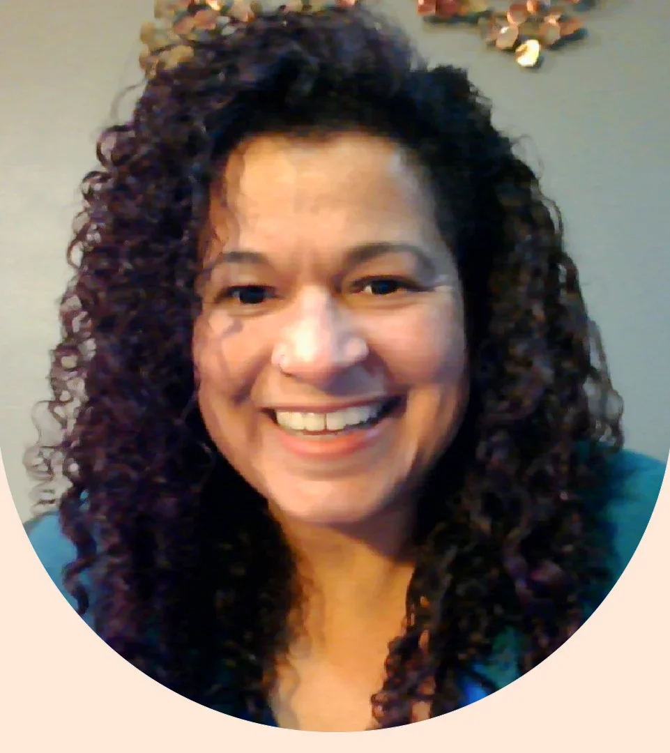 Raven Moore Amerman is pictured in a headshot.