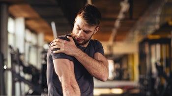 Health: Musculoskeletal: man shoulder pain-1057157450