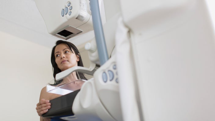 A person getting a mammogram.