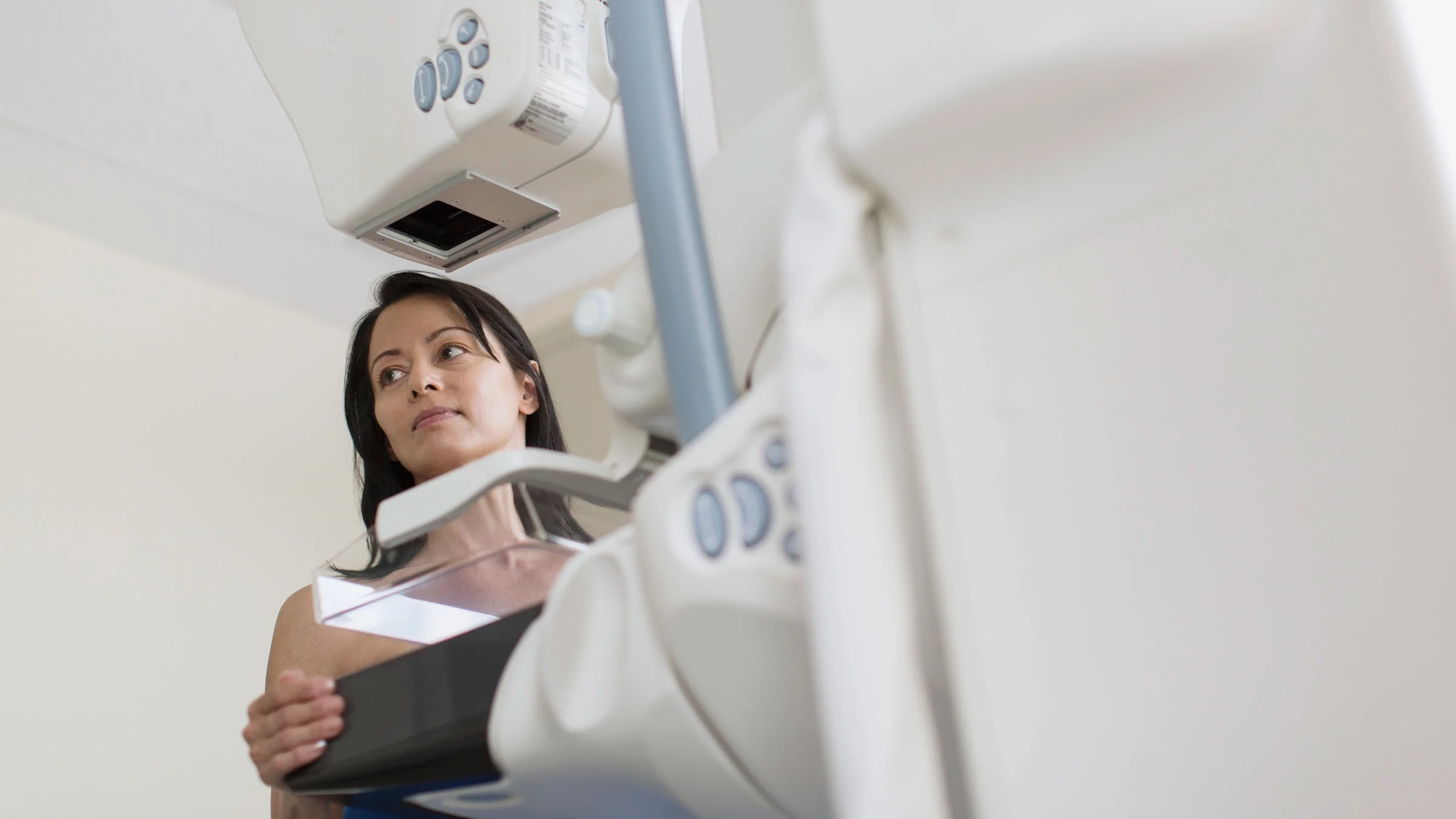 A person getting a mammogram.