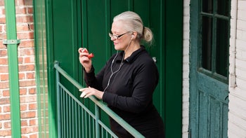 Asthma: woman using inhaler 1222038819