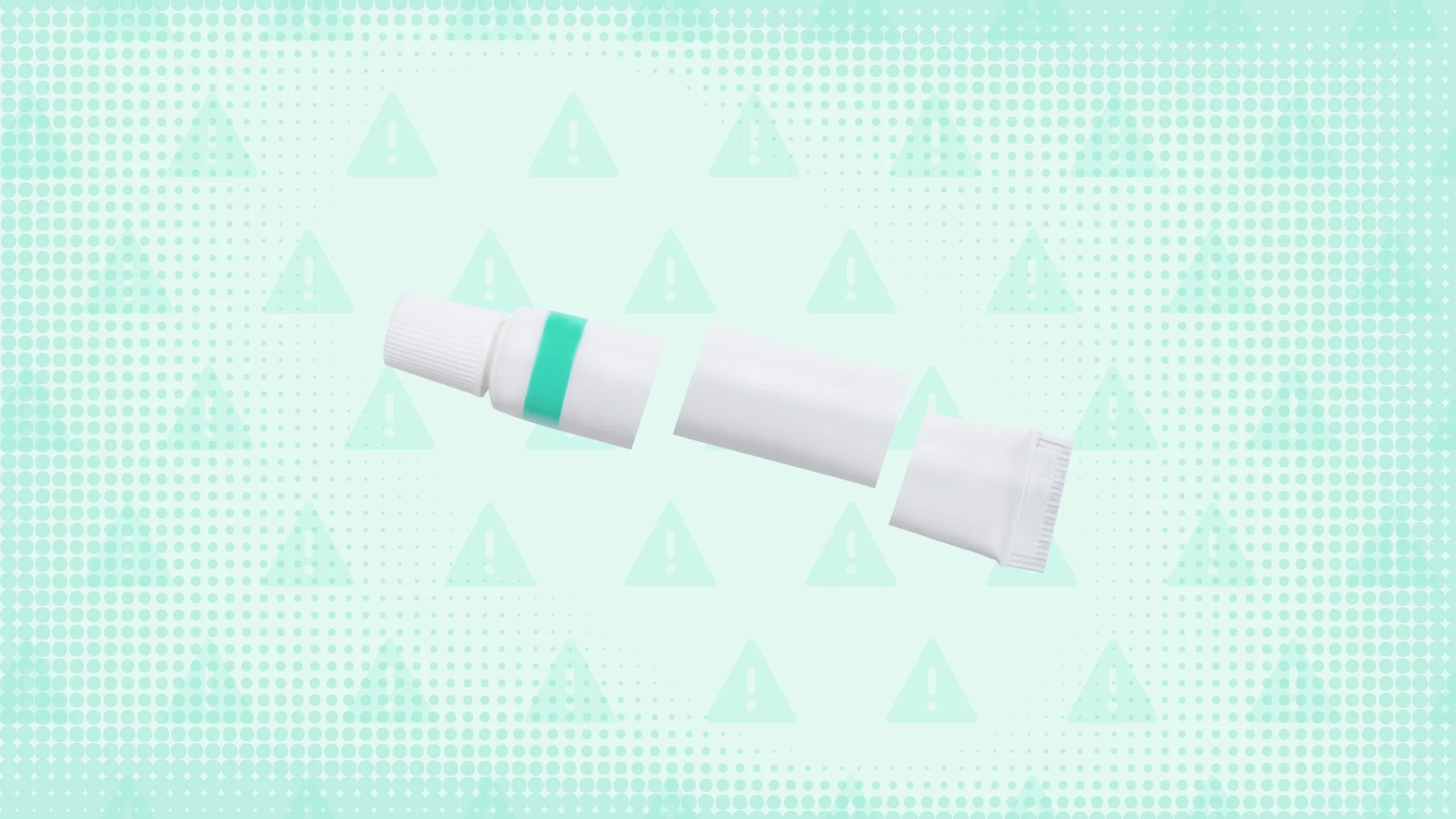 Light teal background with texture and warning sign pattern. In the center is a white and teal ointment tube cut into thirds. 