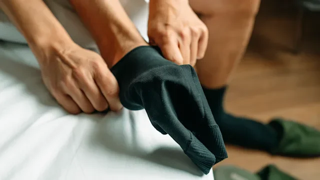 Dermatology: closeup_putting_on_compressio_socks_1467890269