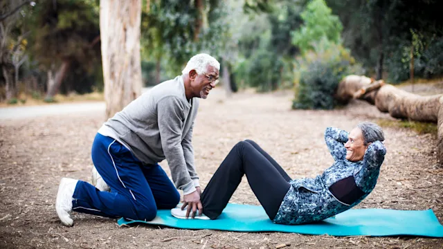 Movement exercise: crunches vs sit-ups: woman sit ups 898430586