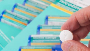 nicotine: closeup nicotine lozenge 505486107