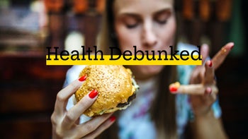 Diet nutrition: Greasy food and acne: debunked woman eating hamburger 1055590912