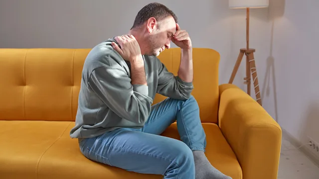 side effects: myopathy: man with neck pain 1957135333