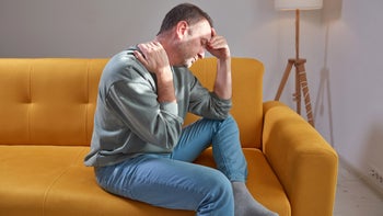 side effects: myopathy: man with neck pain 1957135333