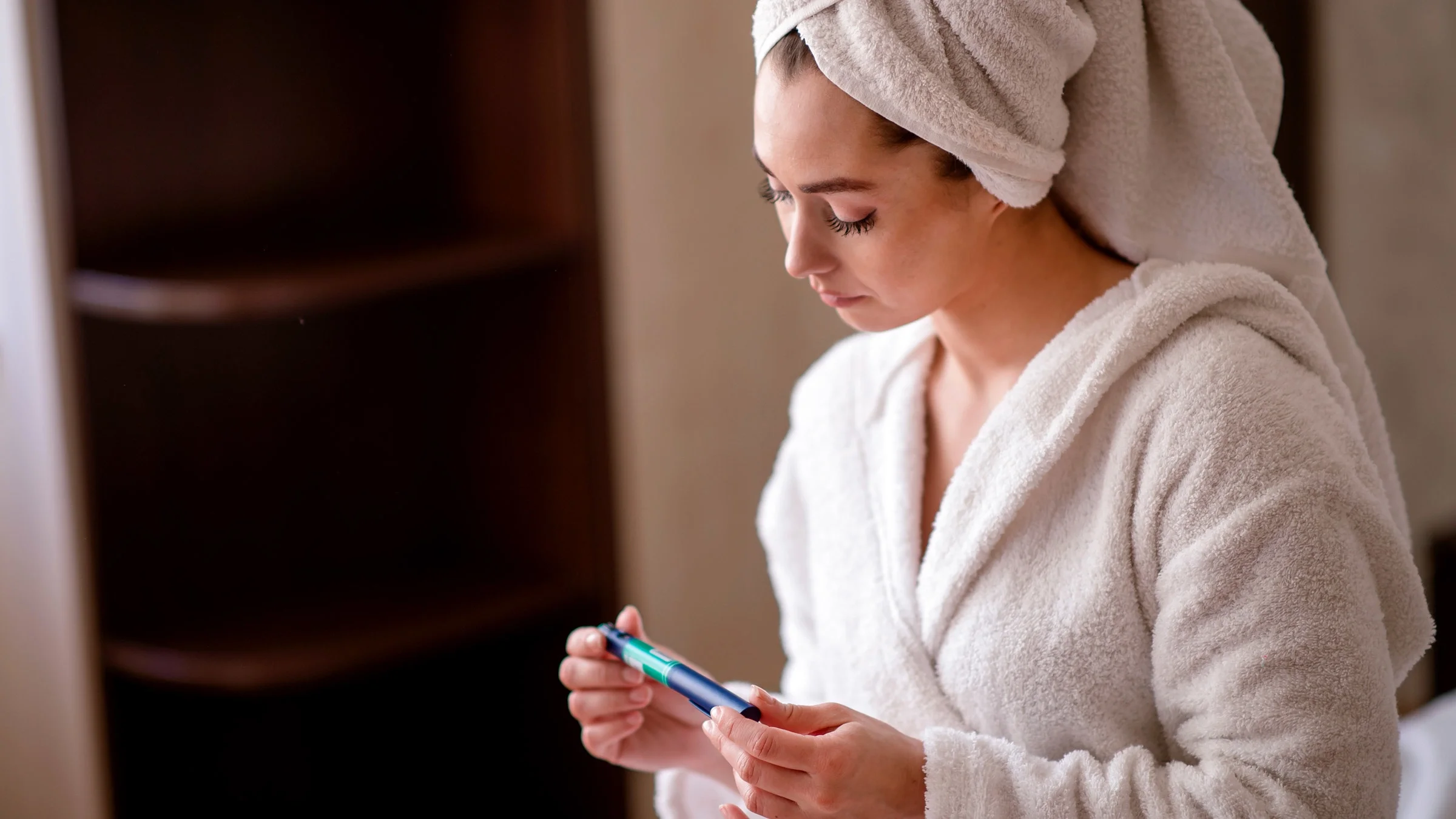 A person taking insulin at bedtime.