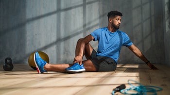 movement-exericse: man stretching gym 1344890104
