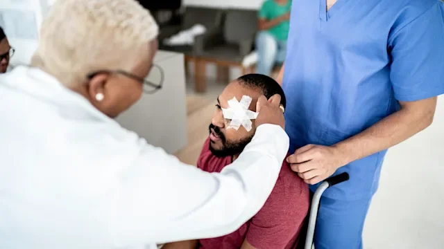 Health: Eye: doctor examining bandages after eye surgery 1199211768