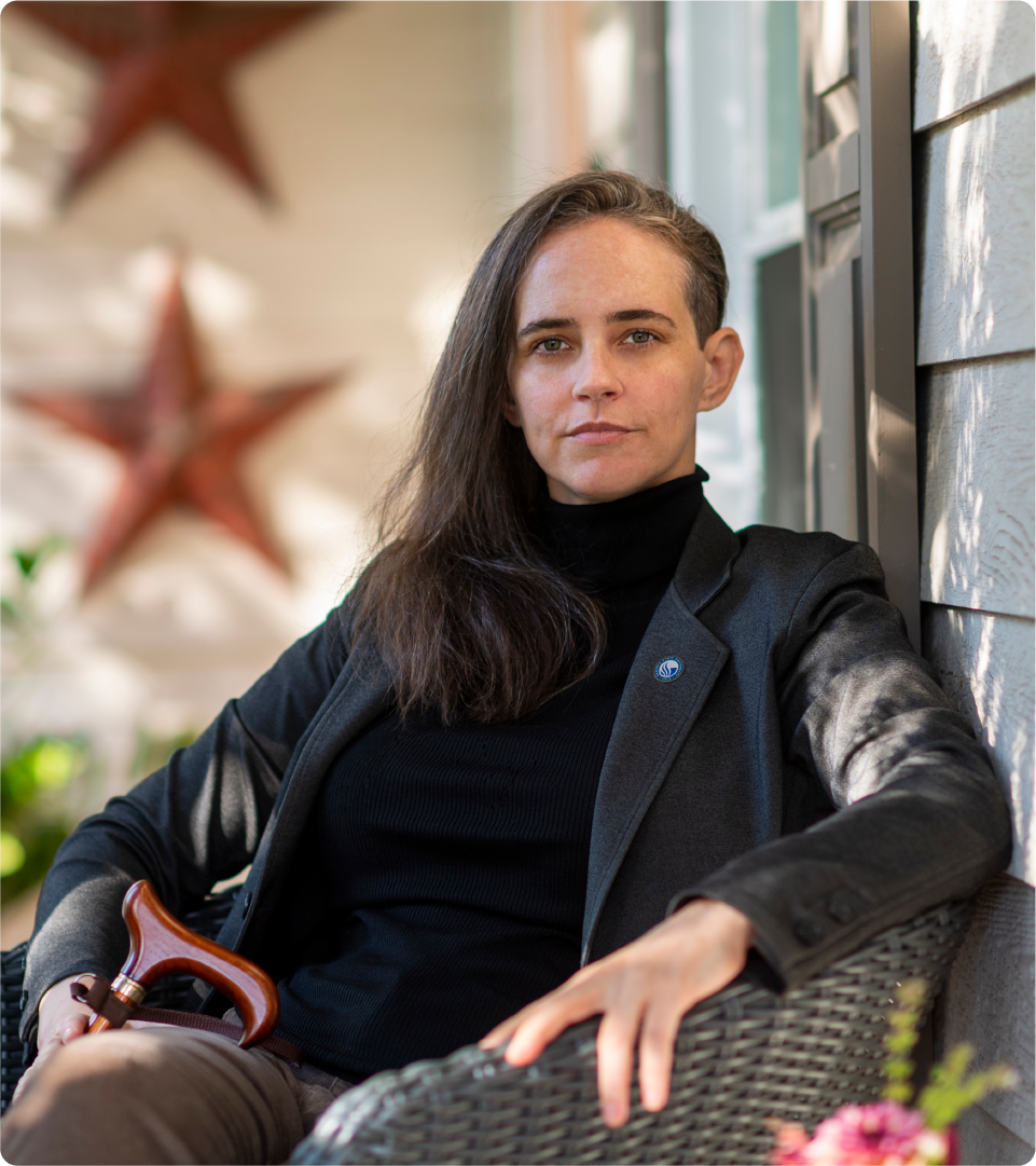 Elizabeth Weaver II is pictured sitting on a porch.