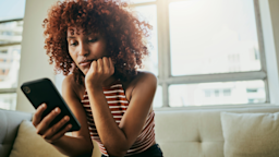 Woman conducts research on her phone.
Delmaine Donson/E+ via Getty Images 