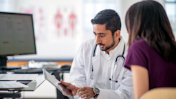 A doctor speaks with his patient.
FatCamera/E+ via Getty Images