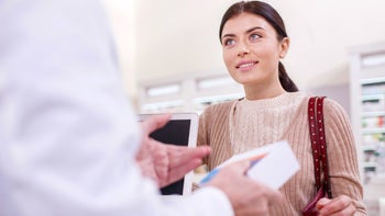 Research: customer at pharmacy cashier 945125104