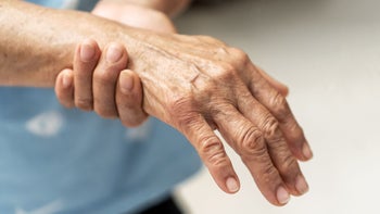 Arthritis: senior person wrist pain-1330548030
