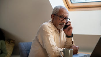 medicare: senior using mobile phone 1994831178