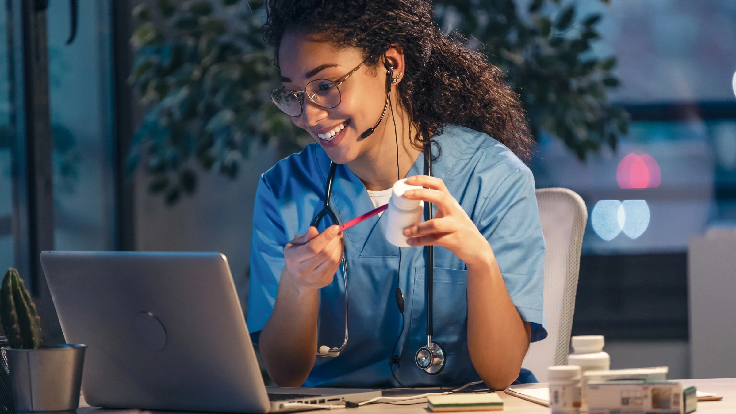 A teledoctor explaining medications to a patient.