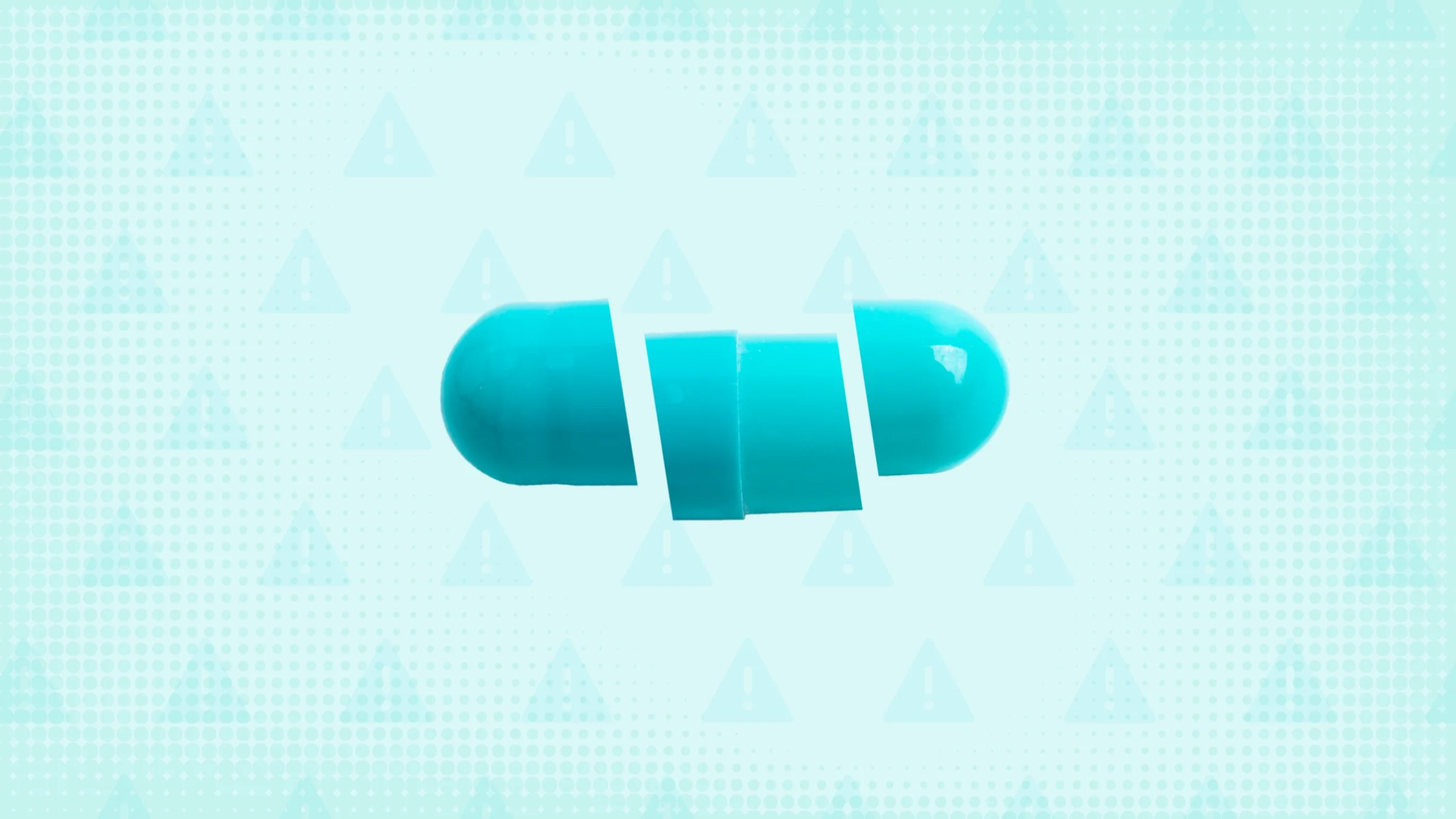 Teal background with texture and warning sign pattern. In the center is a teal capsule pill cut into thirds. 
