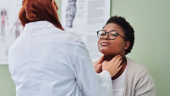 Health: Levothyroxine: doctor checking patients thyroid 1328087052
