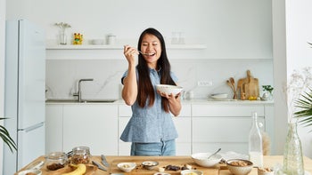 Health: Diet and nutrition: woman eating oatmeal 1472753860