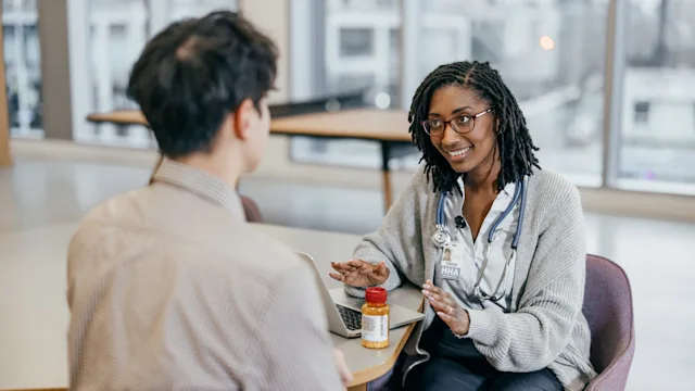 Health: Urology: discussing pills with patient 1474919840