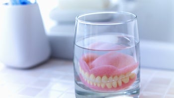 Dental care: closeup denture soak 164850680
