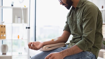 Alcohol: closeup man with IV drip 2148098759