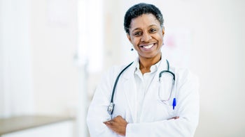 black health: portrait of doctor smiling 920949364