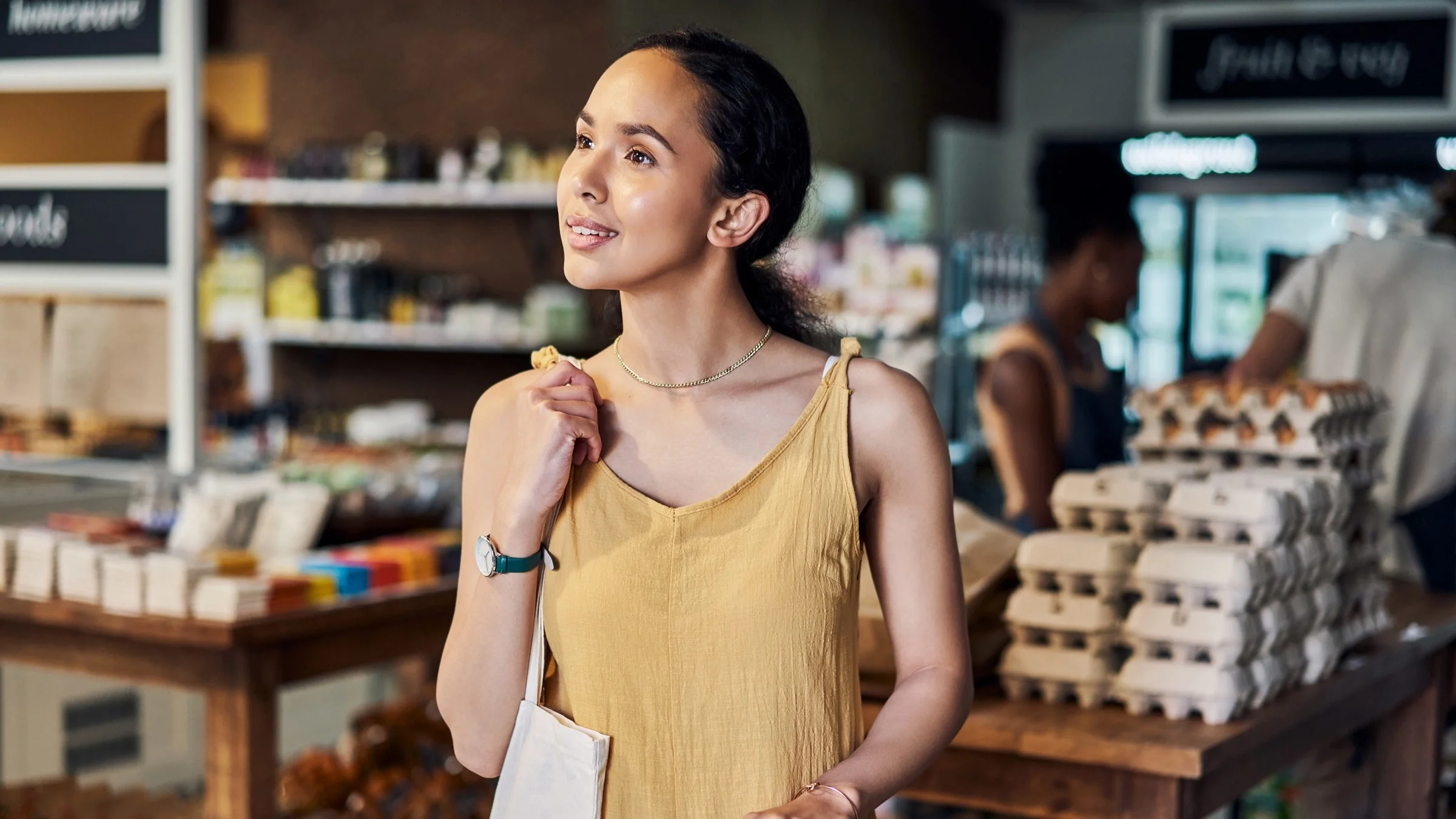 A person shopping in an organic store.